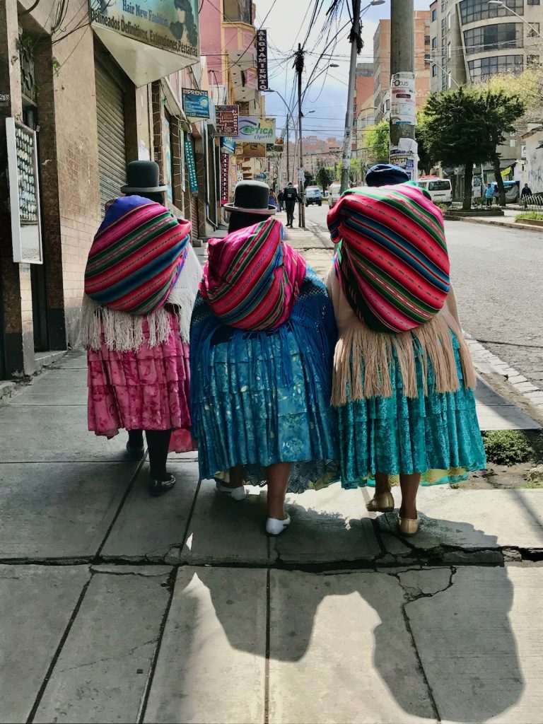 Cholitas looking for things to do in La Paz, Bolivia.