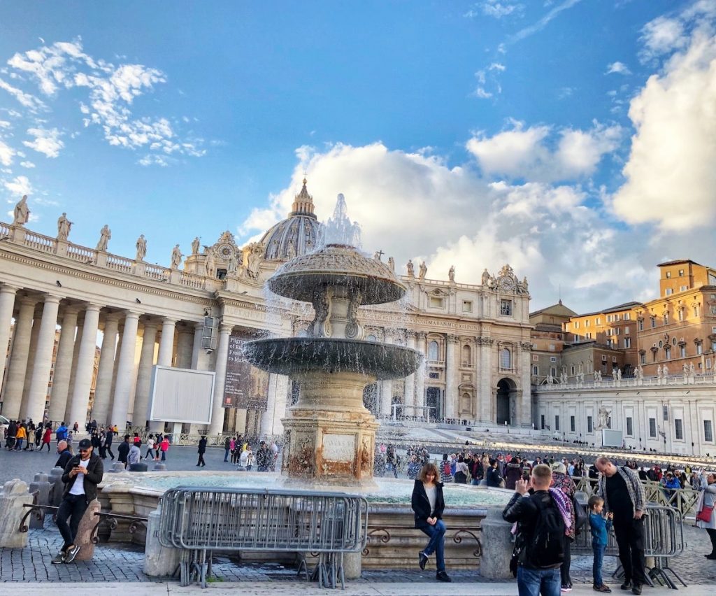 Fountain overlooking the bust streets of Vatican City