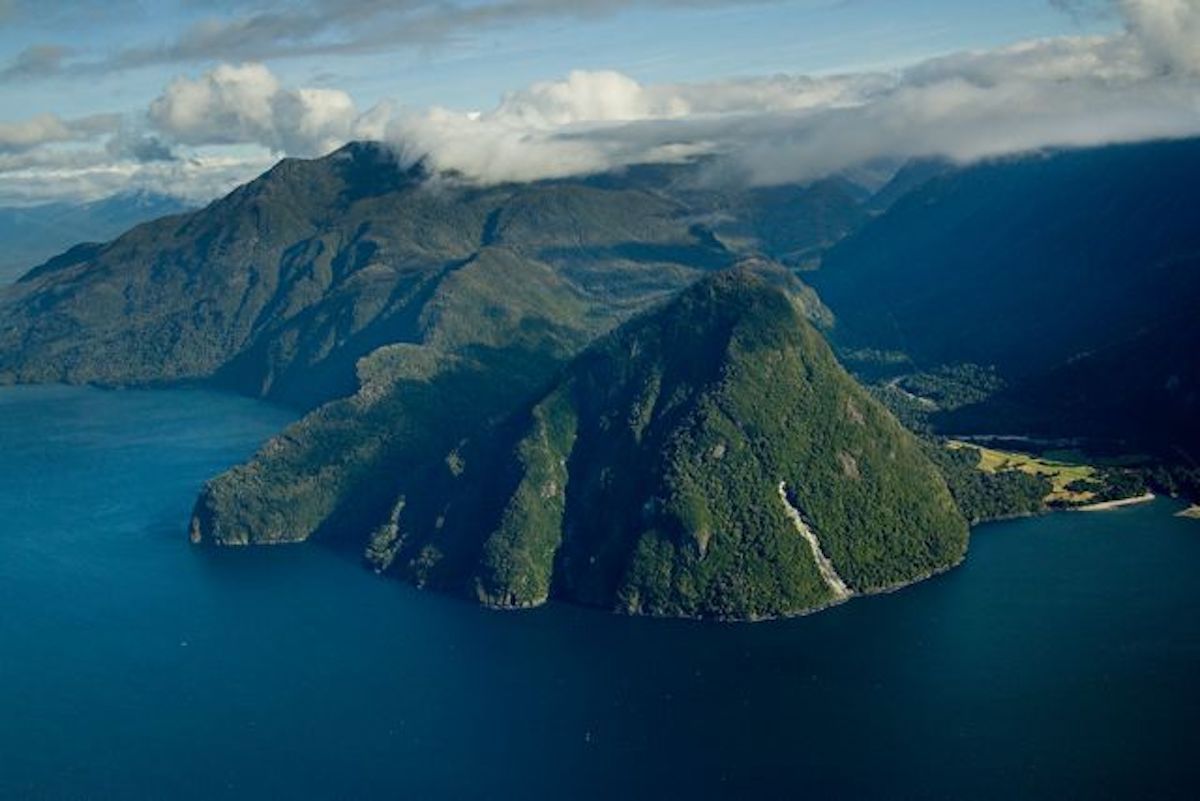 Lush green hills in the distance at Pumalin National Park in Chilean Patagonia