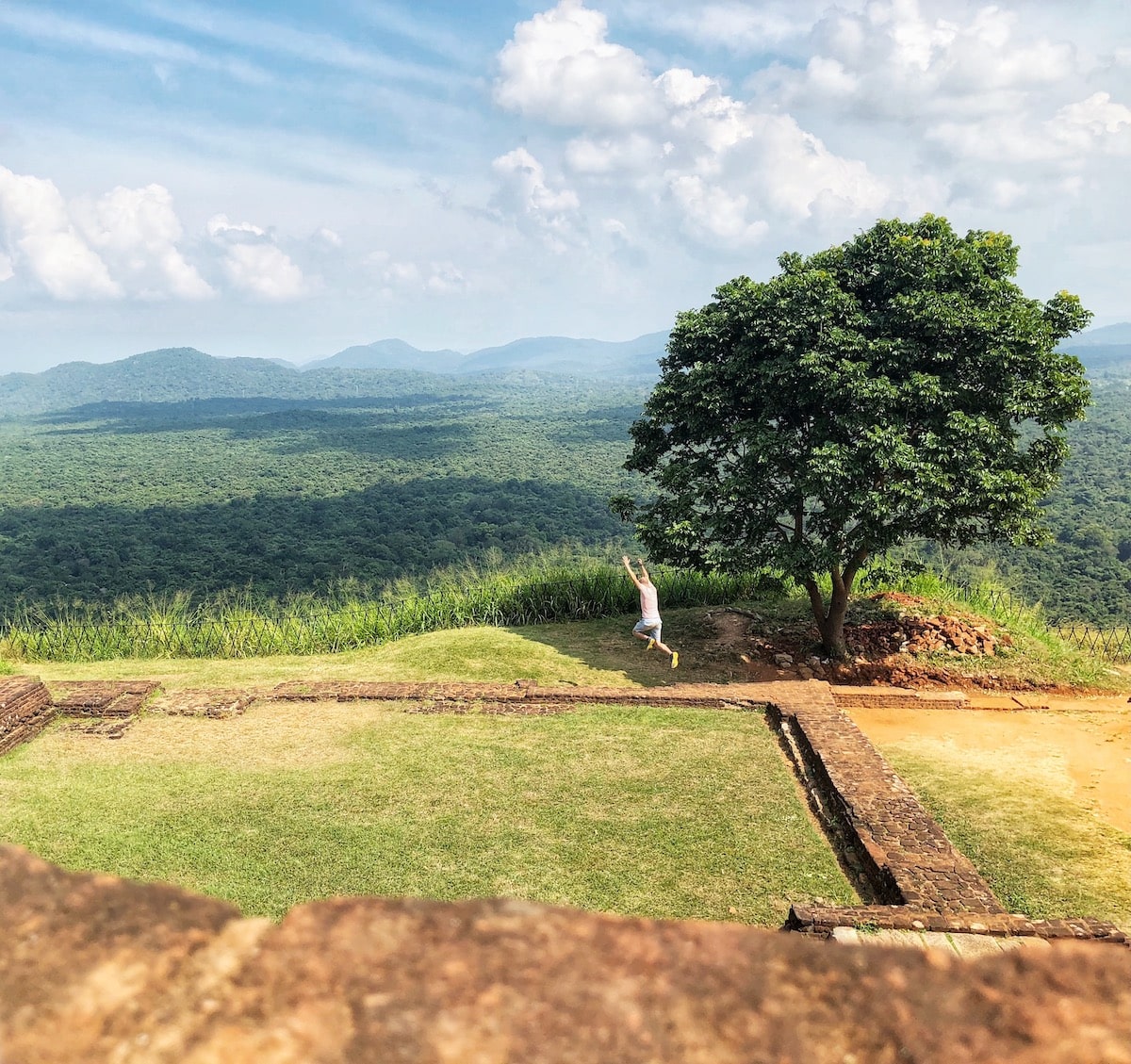 Man jumping at Sigiriya Rock, Sri Lanka