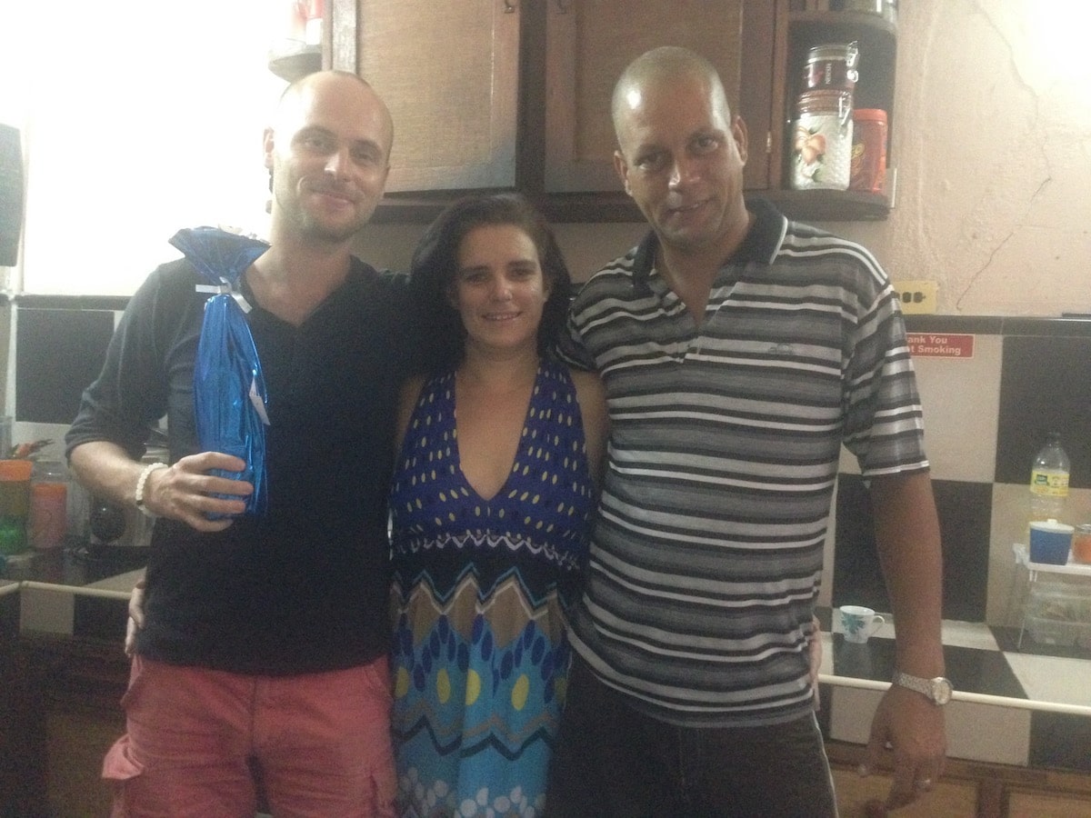 Casa Particular family with tourist in Havana, Cuba