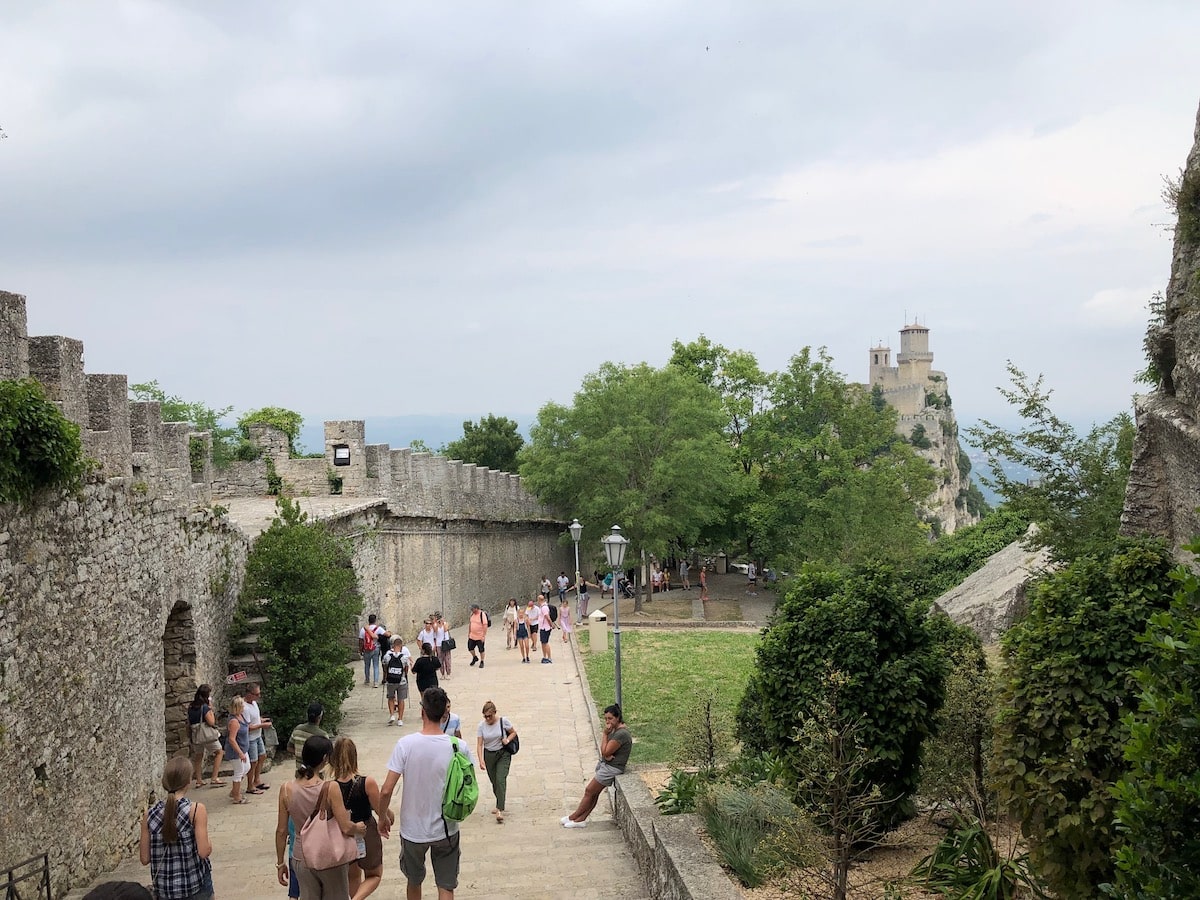 People walking around Guaita Fortress, San Marino