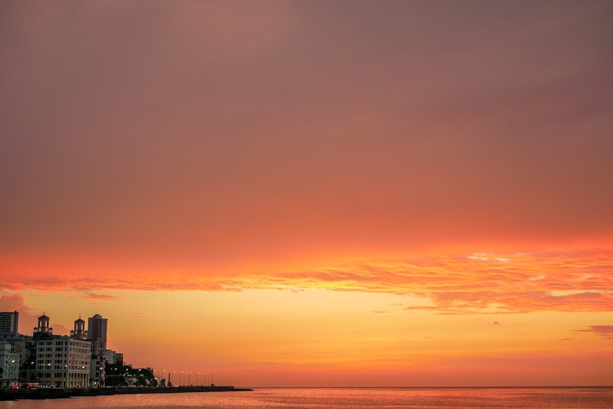 Stunning red sky sunset at the Malecon in Old Havana, Cuba