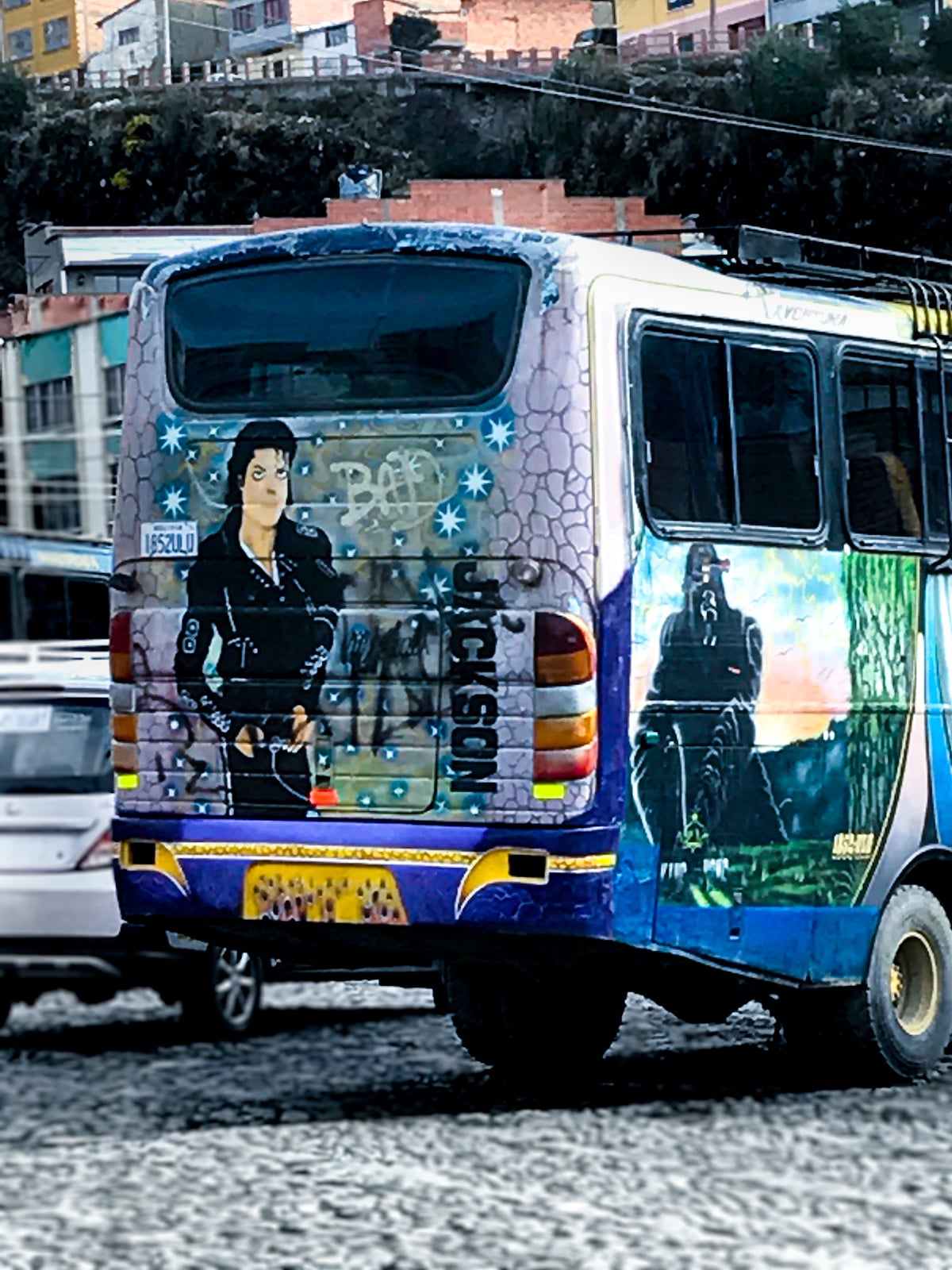 A bus with a painting of Darth Vader and Michael Jackson in La Paz, Bolivia.