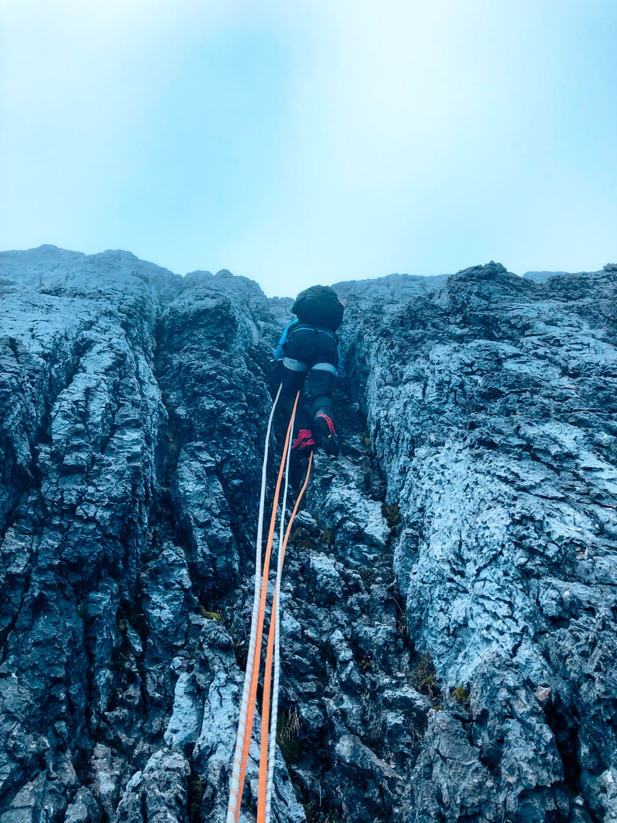 Abseiling down a mountain