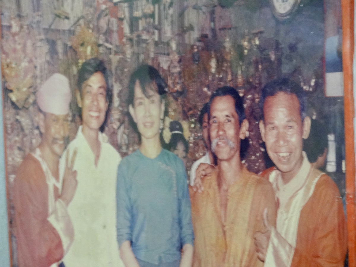 Aung San Suu Kyi with The Moustache Brothers, famous comedians of Mandalay, Myanmar 