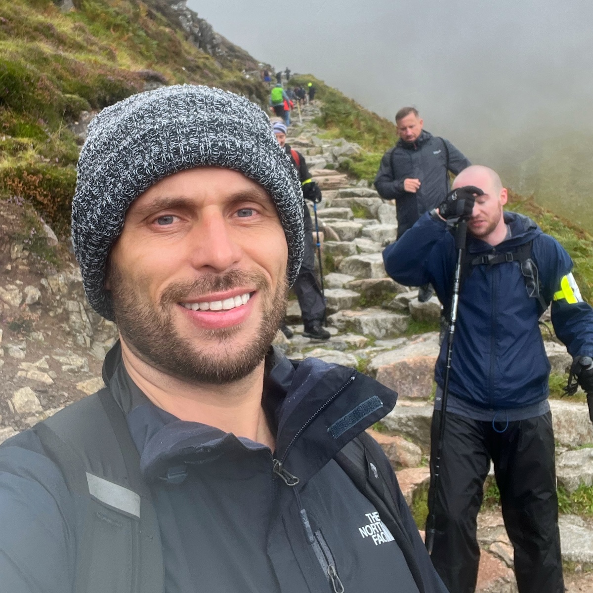 Hikers looking tired on Ben Nevis, Scotland