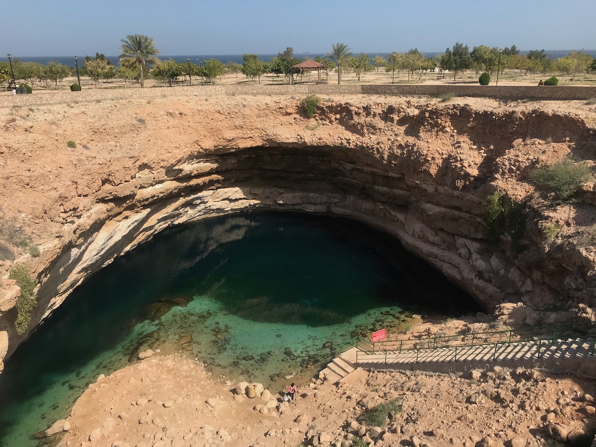 Stairs lead into a sinkhole outside of Muscat, Oman. 