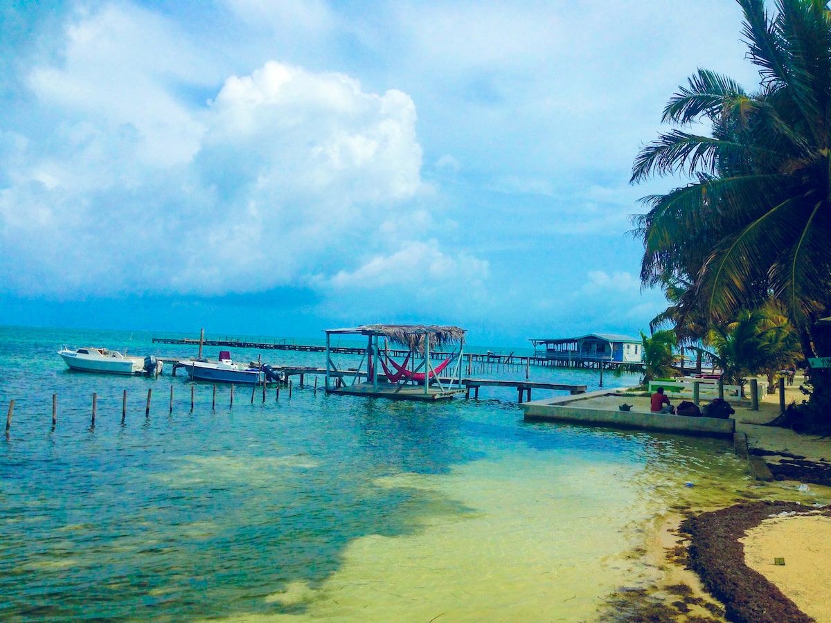 Caribbean Sea on from Caye Caulker with boats and kayaks.