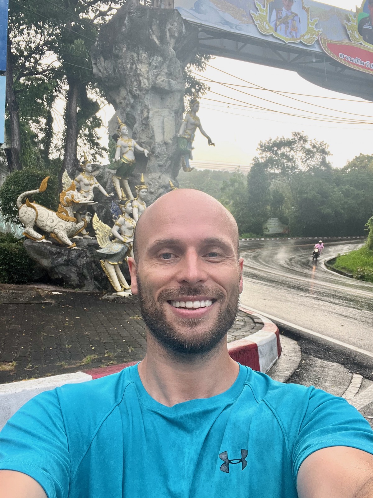 Elated (and tired) smiles after my first sub-2 hours of the Doi Suthep hill half marathon
