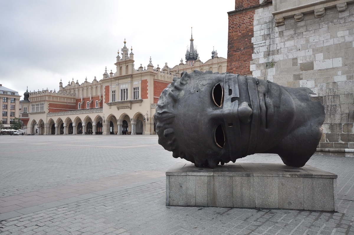 The Eros Bendato Sculpture is a large decapitated face lying on it's side 
