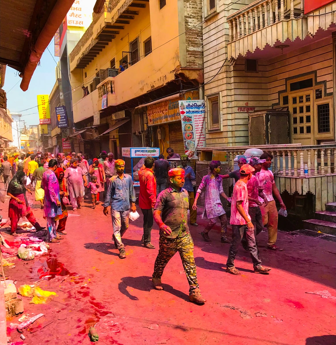 Men walking during the worst Holi ever 