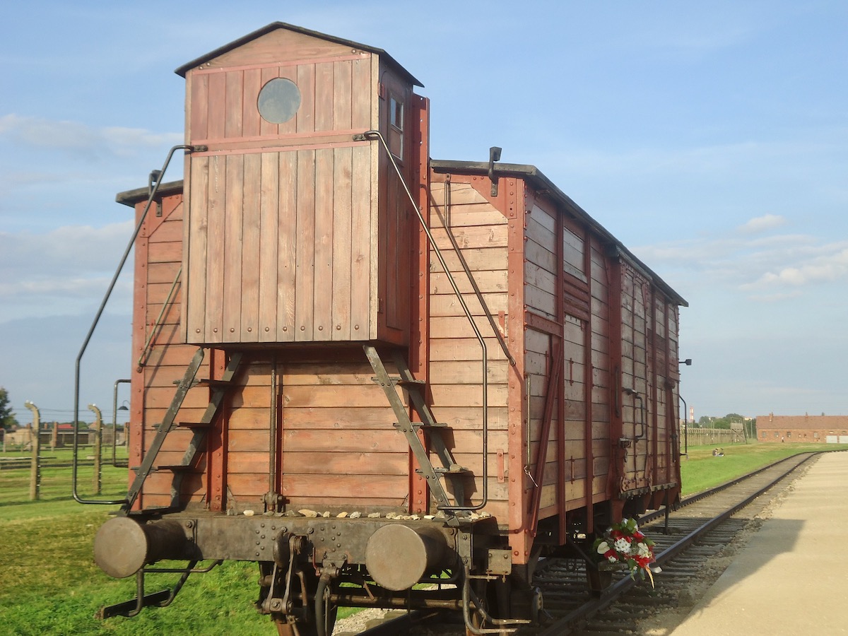 A former holocaust train stands on the railway in the Auschwitz museum.