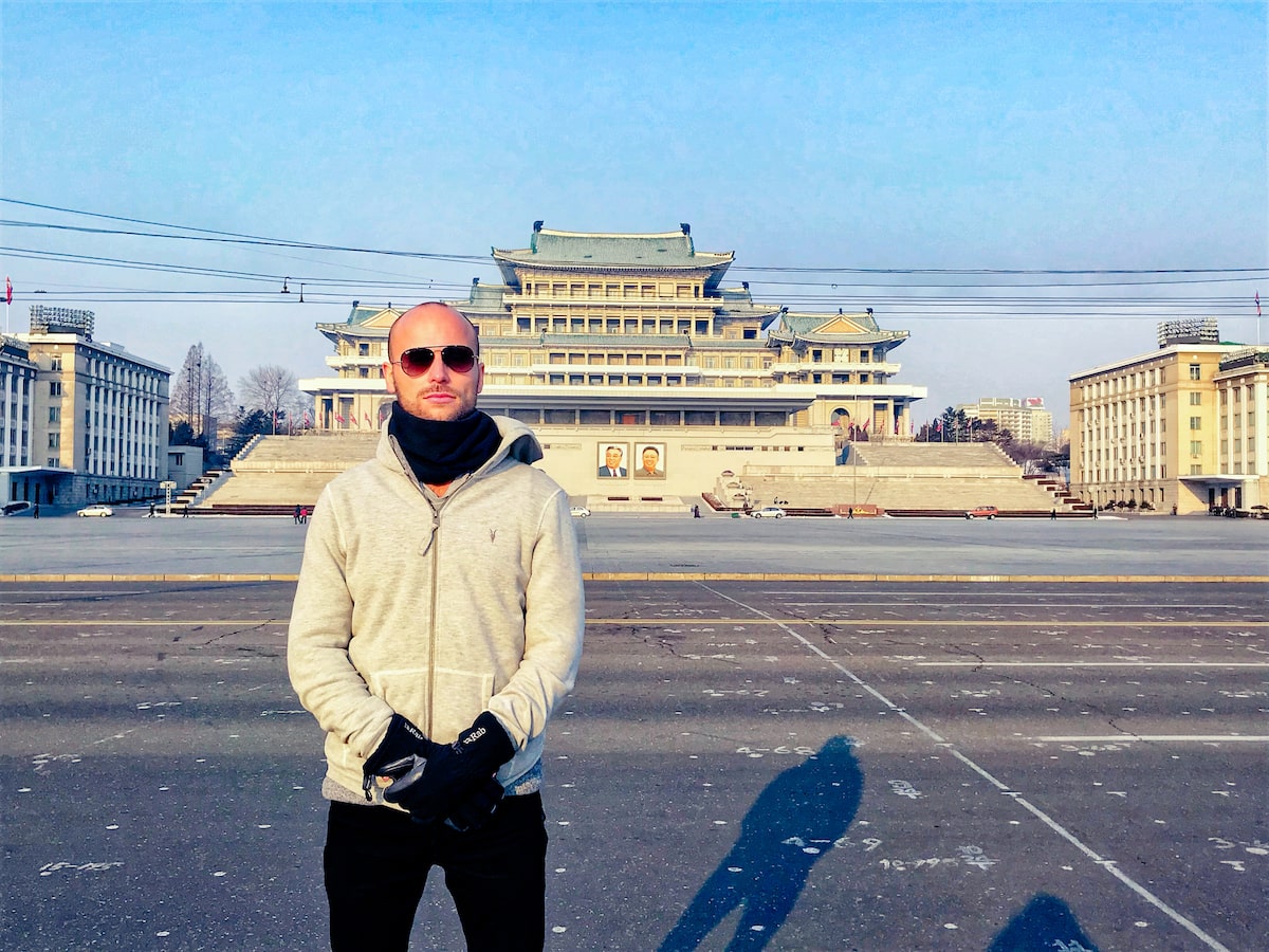 Male tourist standing in Kim Il-sung Square