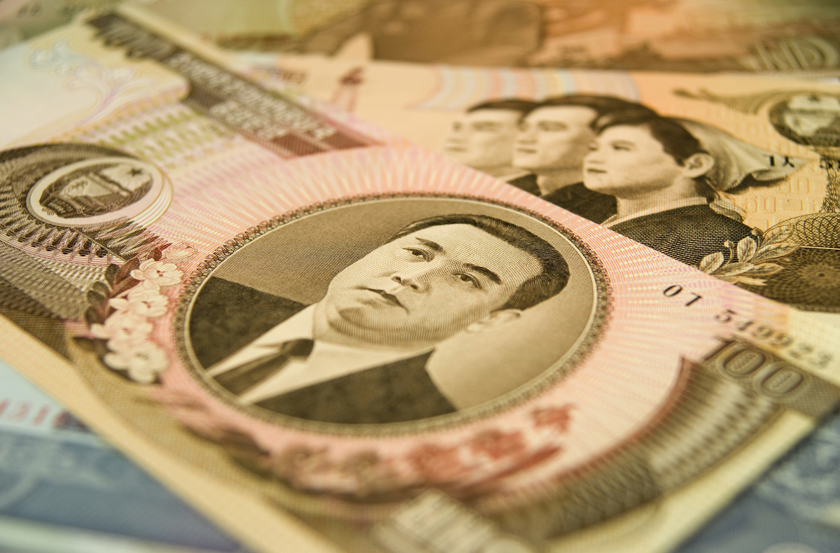 North Korean currency up close depicting images of their former leader, Kim Il-Sung, who was the leader of the Democratic People’s Republic of Korea until his death in 1994