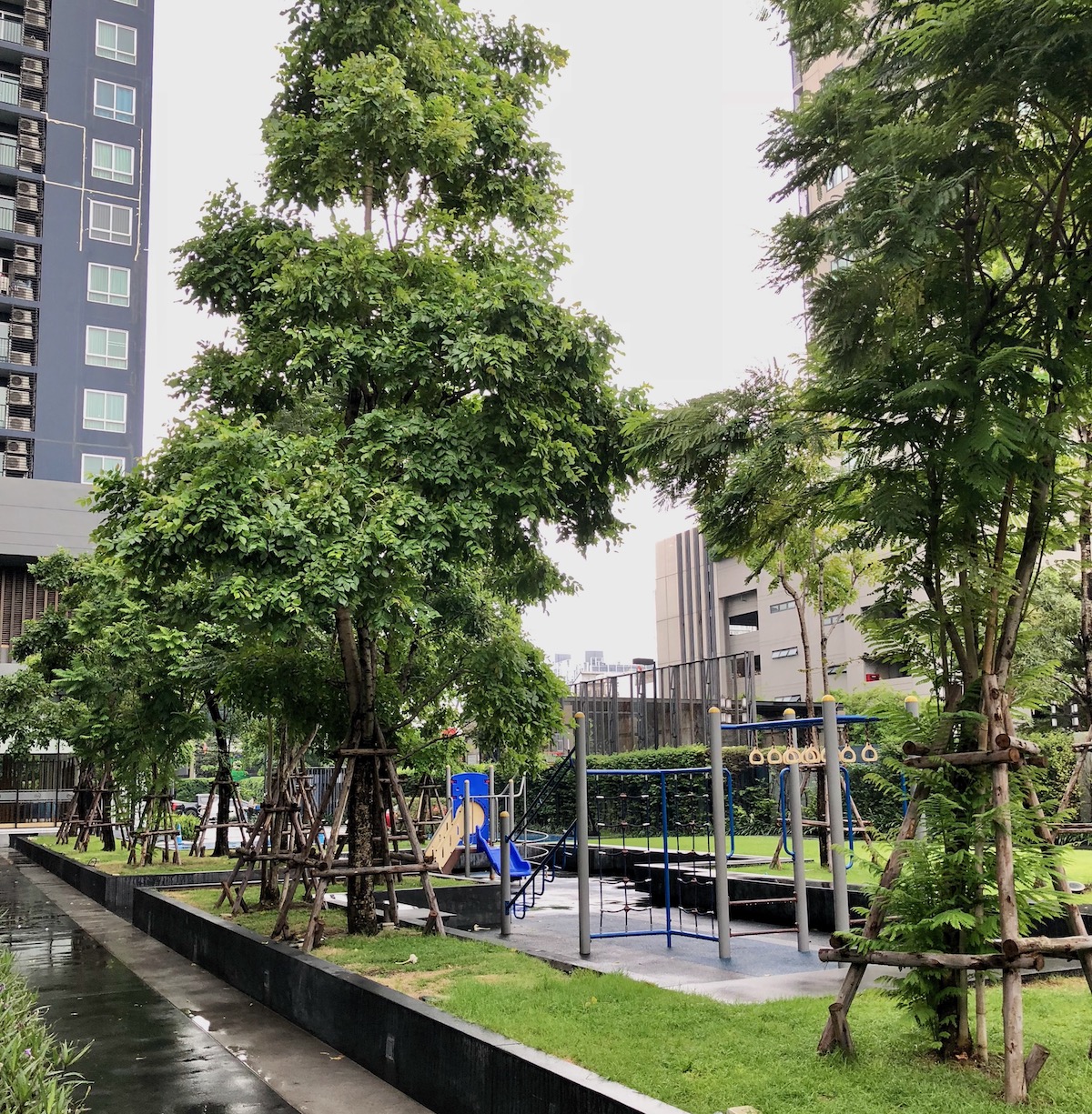 A park on greenery outside a condo in On Nut, Bangkok