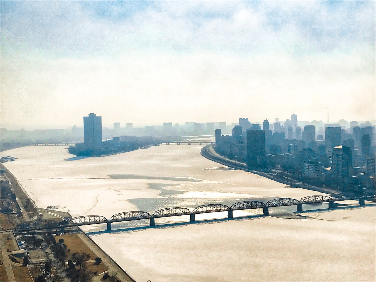 The skyline of Pyongyang during a misty day in North Korea's capital city