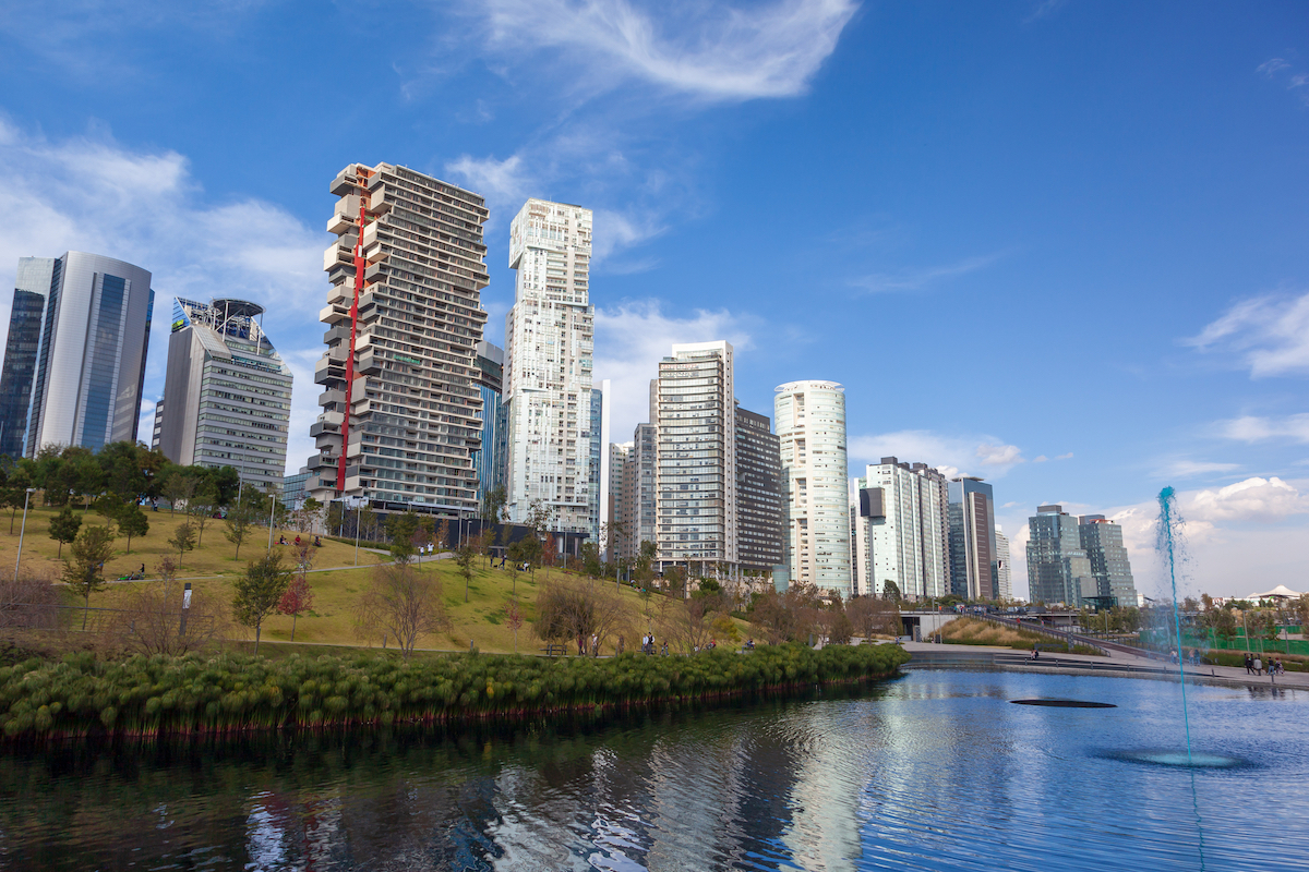 La Mexicana Park with modern and beautiful skyscrapers on Santa Fe, Mexico City's major business districts.