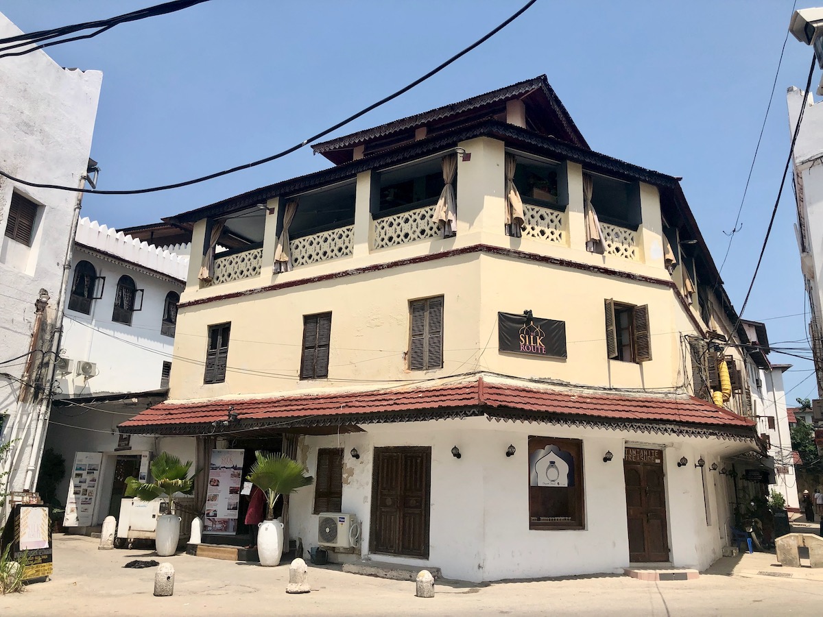 A yellow building named Silk Route