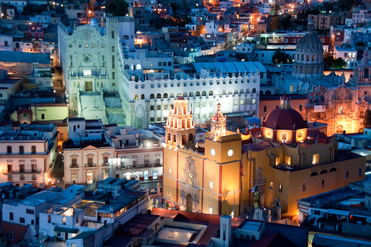 A beautiful coloured city at night.