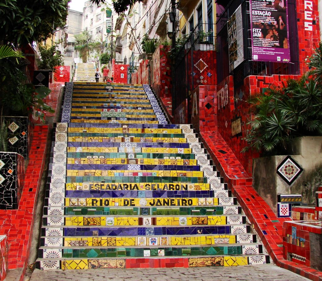 Steps with the colour theme of the Brazilian flag and beautiful mosaics in Lapa, Brazil.