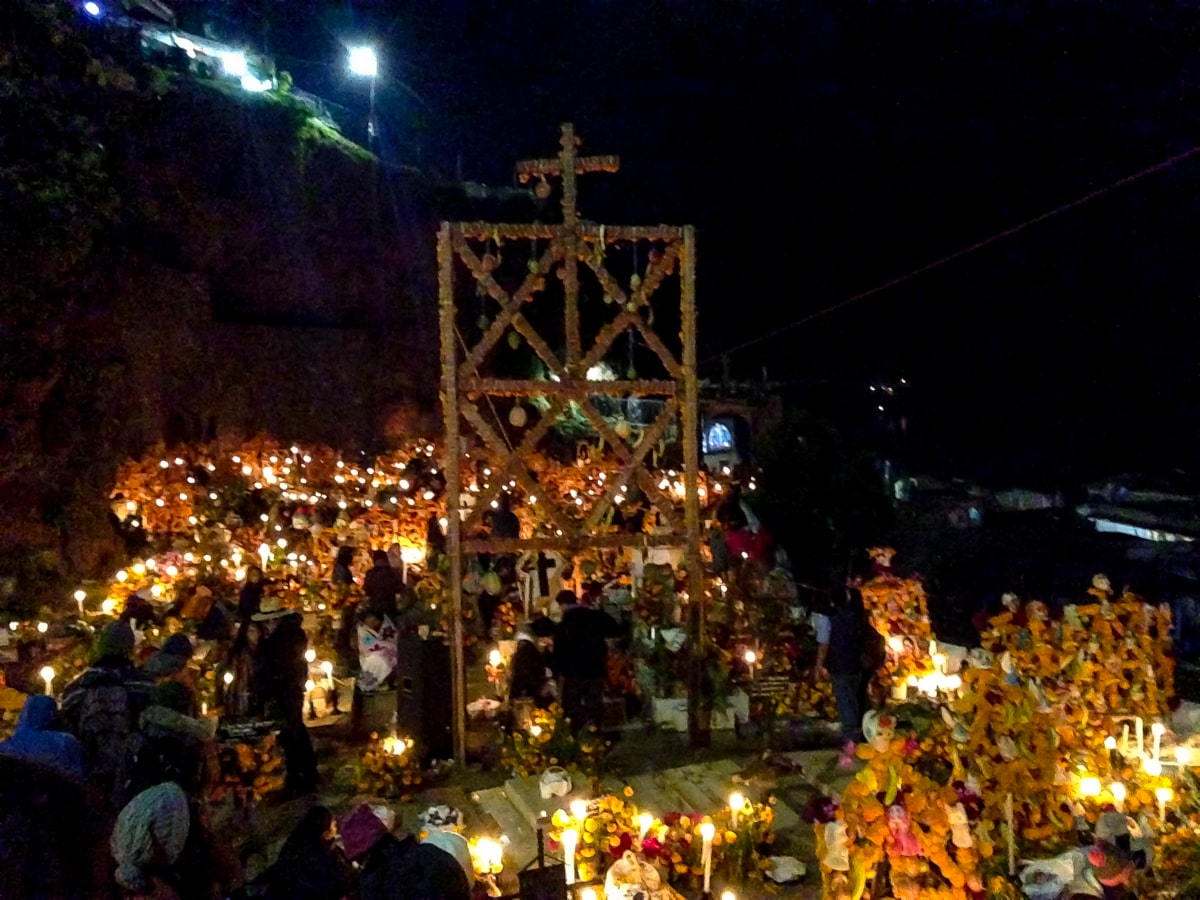 Graves lit up at night in Mexico