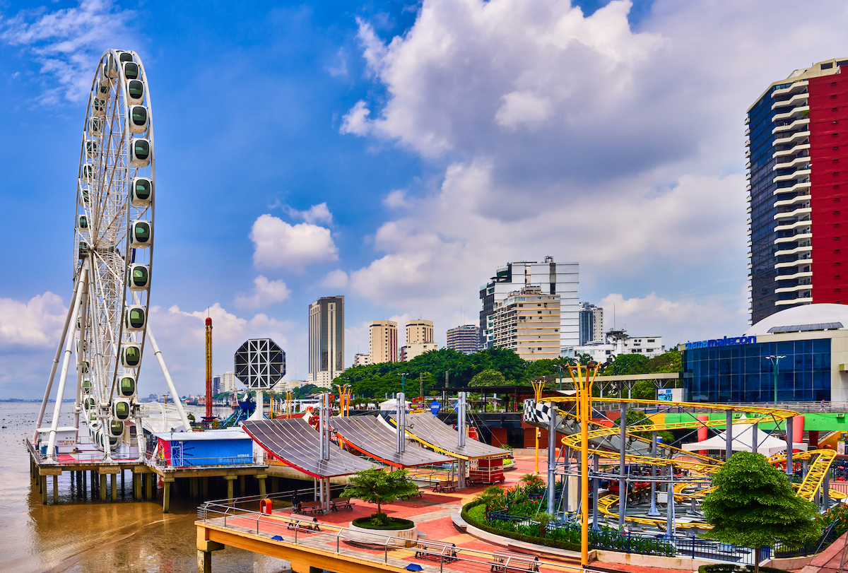 An empty amusement park with a large Ferriss wheel in Guayaquil, Ecuador.