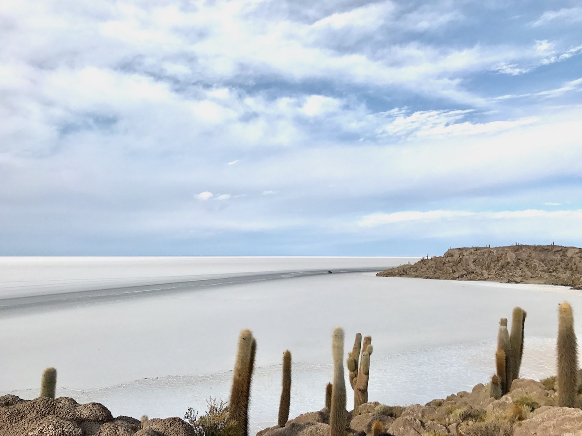 A barren desert landscape in Salar de Uyuni of Bolivia, the largest salt flats in the world.