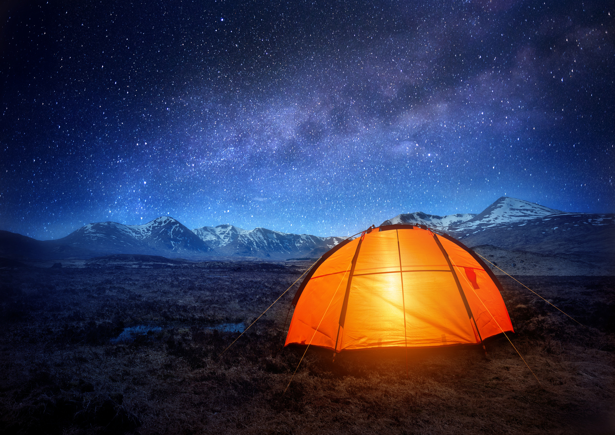 Mosquito Bites on the Road: What to Do When You're Itching in the Middle of Nowhere | mosquito bites camping A tent pitched at a remote campsite at dusk