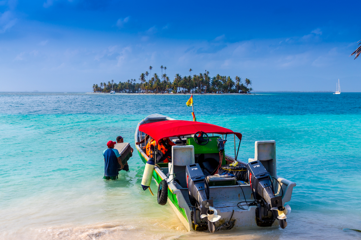 Locals stock up a small water taxi in the San Blas Islands of Panama.