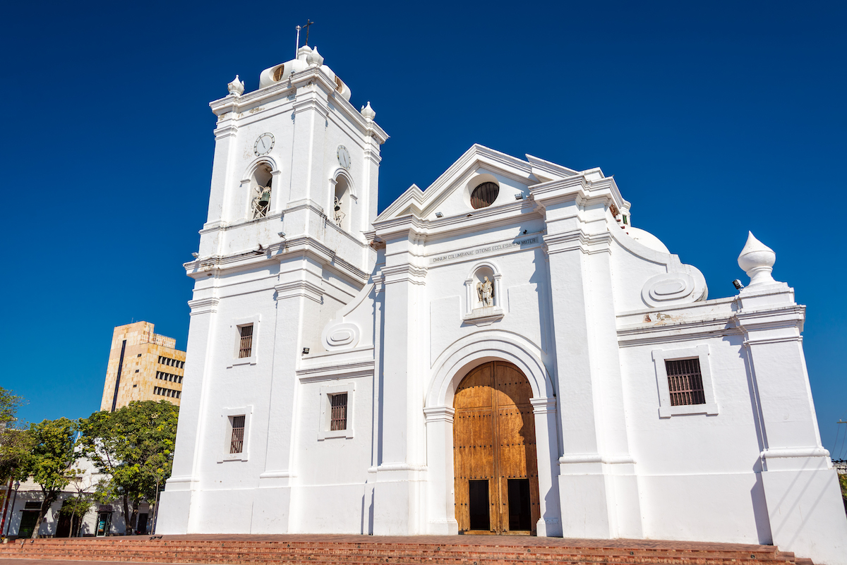 A striking white cathedral on a clear blue-sky day in Santa Marta, Colombia.