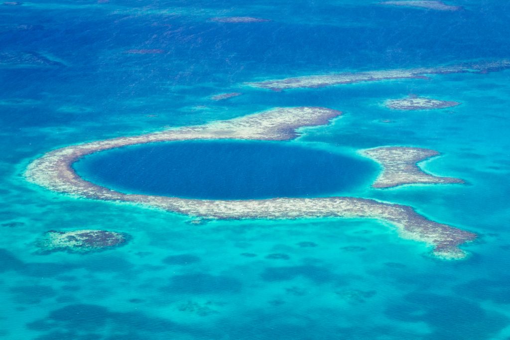 An Aerial view of the Great Blue Hole, off the coast of Belize