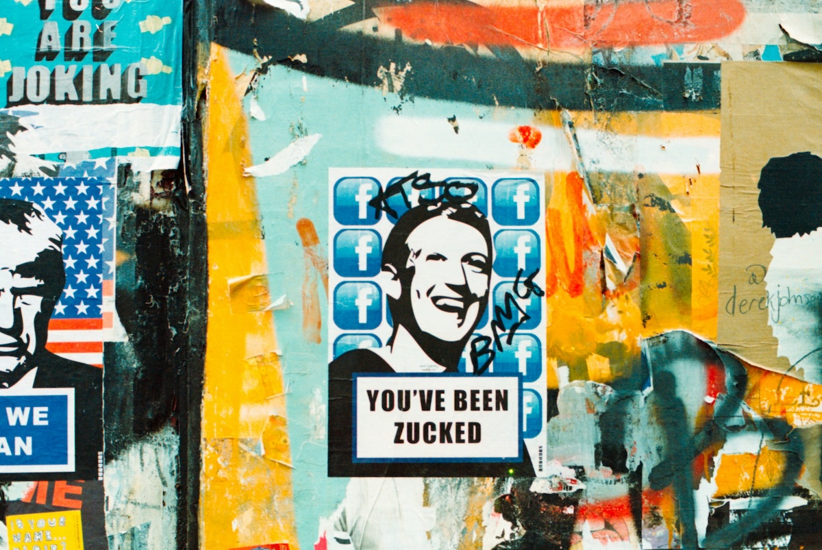 Street art depicting Mark Zuckerberg smiling with the words "you've been Zucked" underneath it